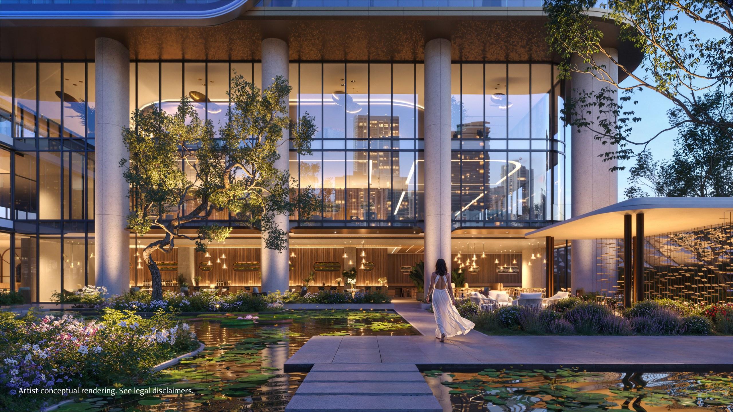 The garden amenity pavilion and lily pond at Anantara Residences Miami at dusk