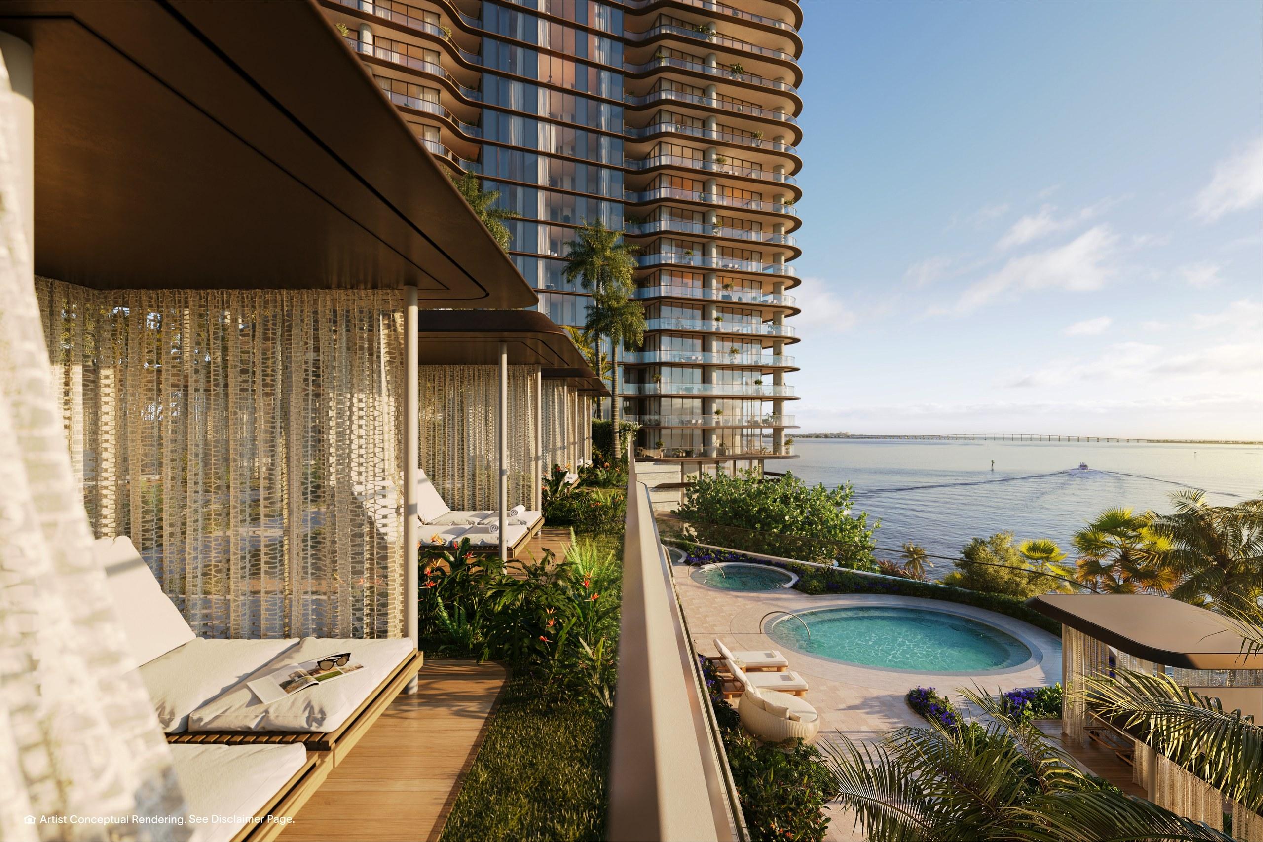 Garden cabanas and the pool terrace above Biscayne Bay at Mandarin Oriental Residences