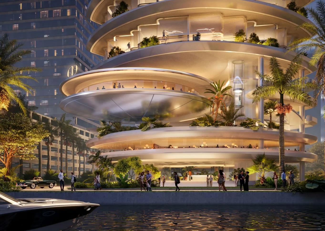 The 619 Brickell tower rising in stacked, rounded terraces above its bayfront podium