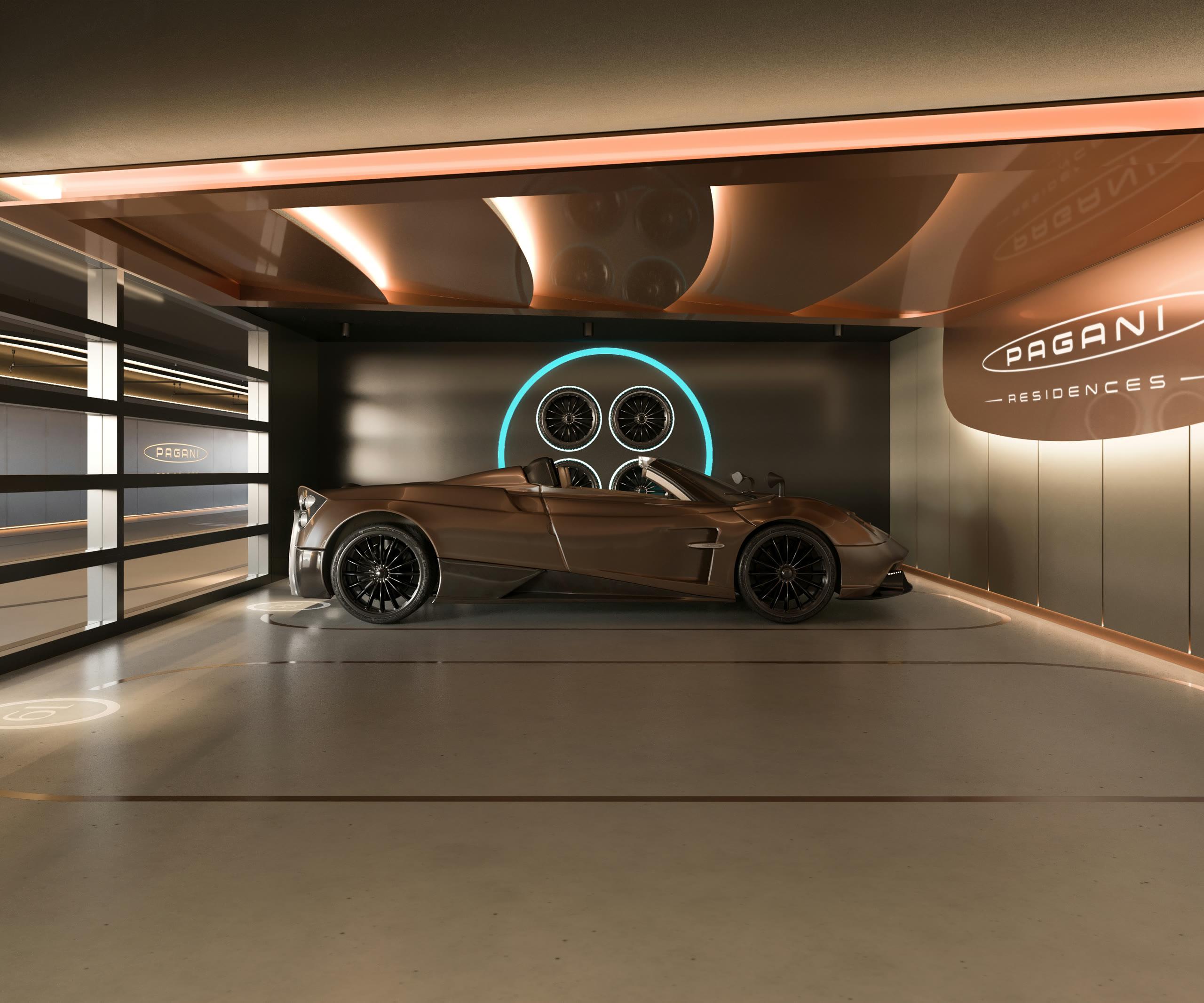 A private in-residence garage with gallery lighting displaying an owner's car like sculpture at Pagani Residences